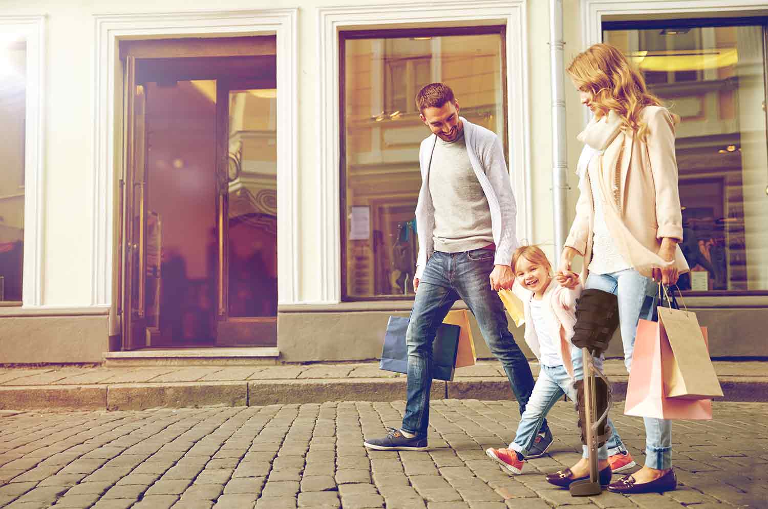 Family shopping with woman wearing XLEG.